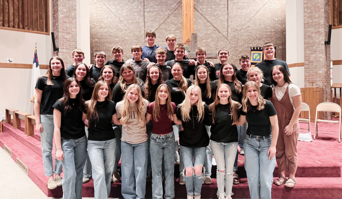 Youth gathered together in a church during a leadership experience